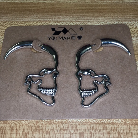Silver Silouhette Skull Earrings - Picture 5 of 5